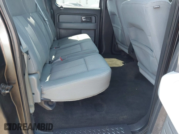 2014 Ford F-150 XL with VIN 1FTFW1ETXEFB51711, listed as a IAAI auction lot 42075381 with 238,603 mi miles. Bid and sale history available at carsss.com. Image 8.