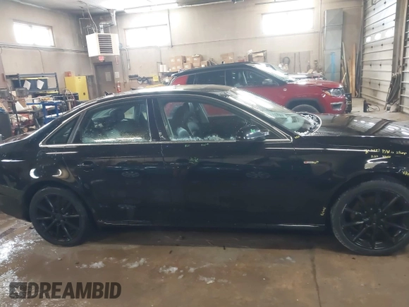 2016 Audi A4 Premium Plus with VIN WAUFFAFL8GN001830, listed as a IAAI auction lot 41863461 with 121,003 mi miles. Bid and sale history available at carsss.com. Image 14.