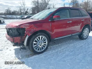 2014 Lincoln MKX with VIN 2LMDJ8JK2EBL06393, listed as a IAAI auction lot 41646903 with 118,394 mi miles. Bid and sale history available at carsss.com. Image 2.