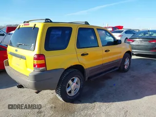 2001 Ford Escape XLS with VIN 1FMYU02191KF55561, listed as a IAAI auction lot 41650852 with 234,247 mi miles. Bid and sale history available at carsss.com. Image 4.