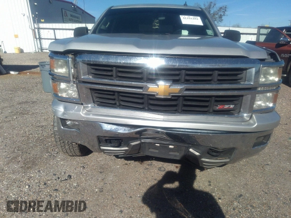 2014 Chevrolet Silverado 1500 LT with VIN 1GCVKREC7EZ120159, listed as a IAAI auction lot 41191282 with 206,836 mi miles and . Bid and sale history available at DreamBid. Image 6.