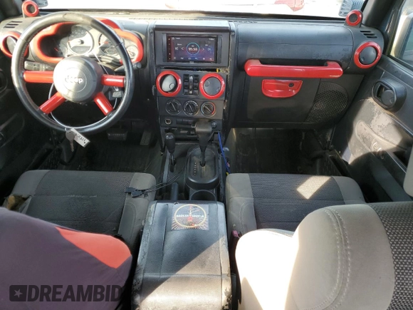 2007 Jeep Wrangler Unlimited X with VIN 1J4GA391X7L171902, listed as a Copart auction lot 82150334 with 167,695 mi miles and Salvage title. Bid and sale history available at DreamBid. Image 8.