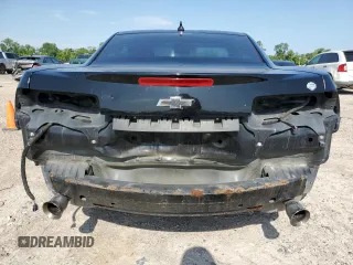 2014 Chevrolet Camaro LS z VIN 2G1FA1E31E9304055, wystawiony jako Copart lot #55321075 z przebiegiem 106 162 mil mil oraz Szkoda całkowita • Salvage title. Historia ofert i sprzedaży dostępna na DreamBid. Obrazek 6.