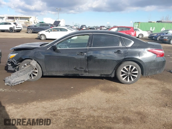2018 Nissan Altima SV with VIN 1N4AL3AP1JC234615, listed as a IAAI auction lot 41665546 with 74,434 mi miles and . Bid and sale history available at DreamBid. Image 13.