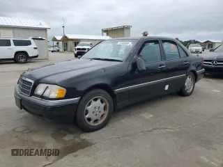 1997 Mercedes-Benz C with VIN WDBHA23EXVF560999, listed as a Copart auction lot 74100944 with Not provided miles and Non repairable. Bid and sale history available at DreamBid. Image 1.