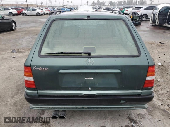 1993 Mercedes-Benz 300 with VIN WDBEA92E7PF259851, listed as a Copart auction lot 50561015 with 214,346 mi miles and Salvage Title. Bid and sale history available at DreamBid. Image 6.
