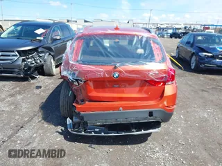 2015 BMW X1 xDrive28i with VIN WBAVL1C57FVY27822, listed as a IAAI auction lot 41977545 with 76,211 mi miles. Bid and sale history available at carsss.com. Image 6.