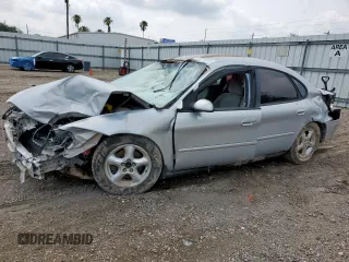 2003 Ford Taurus SES Standard with VIN 1FAFP55U73A248328, listed as a Copart auction lot 58923815 with 220,627 mi miles and Salvage title. Bid and sale history available at DreamBid. Image 1.