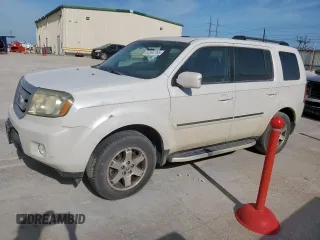 2011 Honda Pilot Touring z VIN 5FNYF3H98BB005411, wystawiony jako Copart lot #52392765 z przebiegiem 155 541 mil mil oraz Szkoda całkowita • Salvage title. Historia ofert i sprzedaży dostępna na DreamBid. Obrazek 1.
