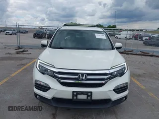 2017 Honda Pilot EX-L z VIN 5FNYF6H55HB098573, wystawiony jako IAAI lot #42347364 z przebiegiem 101 558 mil mil oraz . Historia ofert i sprzedaży dostępna na DreamBid. Obrazek 6.