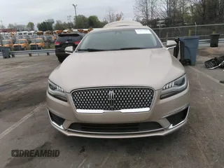 2017 Lincoln MKZ Reserve z VIN 3LN6L5E94HR615115, wystawiony jako IAAI lot #41947698 z przebiegiem 122 090 mil mil oraz . Historia ofert i sprzedaży dostępna na DreamBid. Obrazek 13.