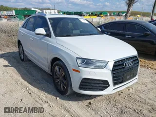 2018 Audi Q3 Premium with VIN WA1BCCFS6JR010047, listed as a IAAI auction lot 41795209 with 99,609 mi miles. Bid and sale history available at carsss.com. Image 1.