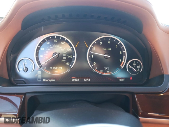 2011 BMW 7 Series 750Li with VIN WBAKB8C52BCY66628, listed as a Copart auction lot 77191054 with 39,503 mi miles and Salvage title. Bid and sale history available at DreamBid. Image 9.