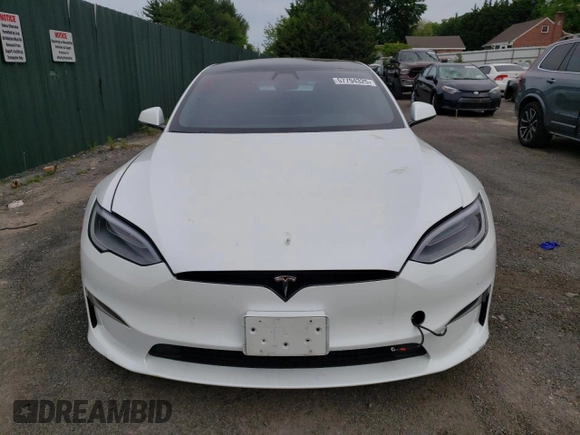 2021 Tesla Model S Long Range z VIN 5YJSA1E59MF438359, wystawiony jako Copart lot #57794325 z przebiegiem 31 651 mil mil oraz Szkoda całkowita • Salvage title. Historia ofert i sprzedaży dostępna na DreamBid. Obrazek 5.