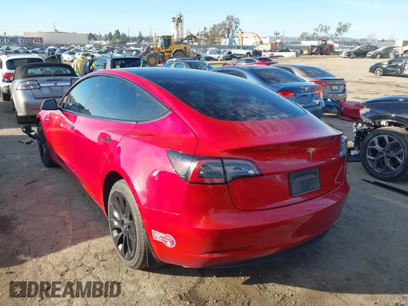 2022 Tesla Model 3 with VIN 5YJ3E1EA1NF288903, listed as a IAAI auction lot 41610215 with 96,050 mi miles and . Bid and sale history available at DreamBid. Image 3.