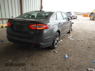2015 Ford Fusion Titanium with VIN 3FA6P0K97FR244227, listed as a IAAI auction lot 41625135 with 119,313 mi miles. Bid and sale history available at carsss.com. Image 4.