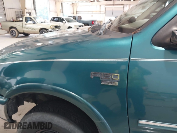 1998 Ford F-150 XL with VIN 1FTRX18L5WNB23716, listed as a IAAI auction lot 42579695 with 305,363 mi miles and . Bid and sale history available at DreamBid. Image 6.