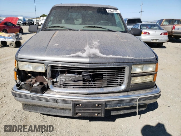 1999 GMC Yukon with VIN 1GKEC13R5XJ761595, listed as a Copart auction lot 69677904 with 174,735 mi miles and Clean Title. Bid and sale history available at carsss.com. Image 5.