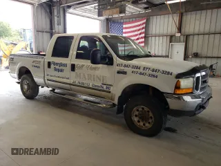 2000 Ford Super Duty F-250 XL with VIN 1FTNW21F2YEE31635, listed as a Copart auction lot 69854734 with 442,635 mi miles and Salvage Title. Bid and sale history available at carsss.com. Image 4.