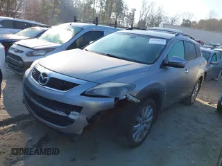 2010 Mazda CX-9 Touring with VIN JM3TB2MA5A0202993, listed as a IAAI auction lot 41654243 with 172,453 mi miles and . Bid and sale history available at DreamBid. Image 2.