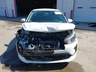 2023 Kia Rio S with VIN 3KPA24AD8PE554914, listed as a IAAI auction lot 41741938 with 24,224 mi miles. Bid and sale history available at carsss.com. Image 6.