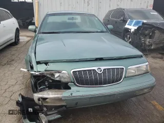 1997 Mercury Grand Marquis GS z VIN 2MELM74W7VX687221, wystawiony jako Copart lot #78665224 z przebiegiem 226 077 mil mil oraz Szkoda całkowita • Salvage title. Historia ofert i sprzedaży dostępna na DreamBid. Obrazek 5.