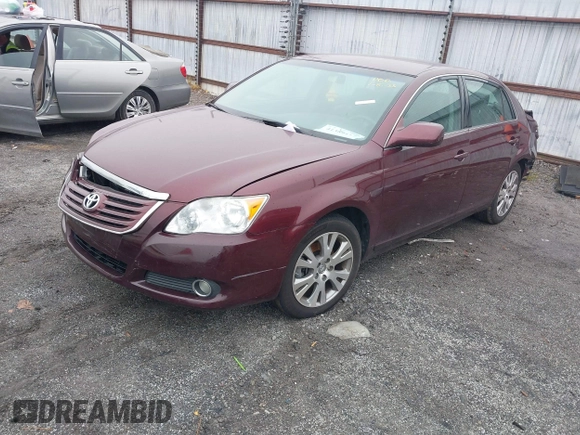 2008 Toyota Avalon XL with VIN 4T1BK36B88U290632, listed as a IAAI auction lot 41389117 with 121,841 mi miles. Bid and sale history available at carsss.com. Image 2.
