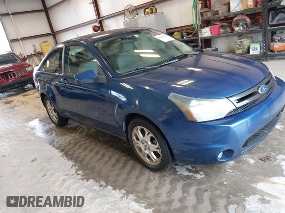 2009 Ford Focus SE with VIN 1FAHP32N09W244420, listed as a IAAI auction lot 41952030 with 165,886 mi miles. Bid and sale history available at carsss.com. Image 1.