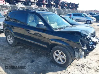 2009 Hyundai Tucson Limited with VIN KM8JN12D59U936273, listed as a IAAI auction lot 41596826 with 202,971 mi miles. Bid and sale history available at carsss.com. Image 1.
