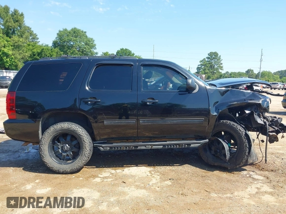2013 Chevrolet Tahoe LS with VIN 1GNSCAE06DR263469, listed as a IAAI auction lot 42245636 with 240,506 mi miles and . Bid and sale history available at DreamBid. Image 14.