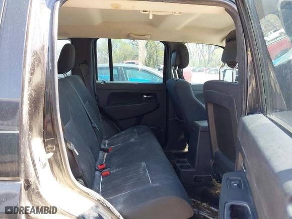 2012 Jeep Liberty Sport with VIN 1C4PJLAK9CW120779, listed as a IAAI auction lot 41901708 with 162,696 mi miles. Bid and sale history available at carsss.com. Image 8.