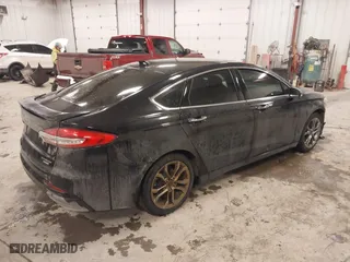 2020 Ford Fusion Hybrid Titanium with VIN 3FA6P0RU8LR141355, listed as a IAAI auction lot 41417807 with 61,288 mi miles. Bid and sale history available at carsss.com. Image 4.