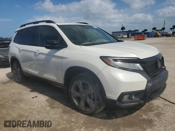 2021 Honda Passport Touring z VIN 5FNYF7H93MB014916, wystawiony jako Copart lot #75050454 z przebiegiem 28 364 mil mil oraz Nie do naprawy • Non repairable. Historia ofert i sprzedaży dostępna na DreamBid. Obrazek 4.