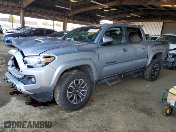 2021 Toyota Tacoma SR with VIN 3TMCZ5AN6MM393306, listed as a Copart auction lot 41483325 with 57,217 mi miles and Salvage title. Bid and sale history available at DreamBid. Image 1.