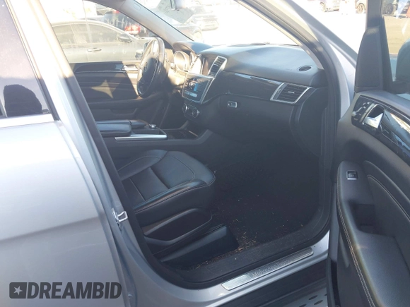 2015 Mercedes-Benz M 350 with VIN 4JGDA5JB9FA561582, listed as a IAAI auction lot 41687386 with 96,784 mi miles and . Bid and sale history available at DreamBid. Image 5.