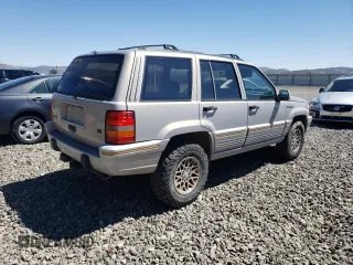 1994 Jeep Grand Cherokee Limited with VIN 1J4GZ78Y0RC190766, listed as a Copart auction lot 54628055 with 217,270 mi miles and Salvage title. Bid and sale history available at DreamBid. Image 3.