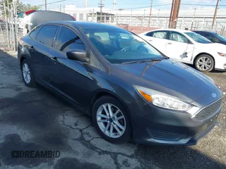2018 Ford Focus SE with VIN 1FADP3F27JL285891, listed as a IAAI auction lot 41750264 with 103,815 mi miles. Bid and sale history available at carsss.com. Image 1.