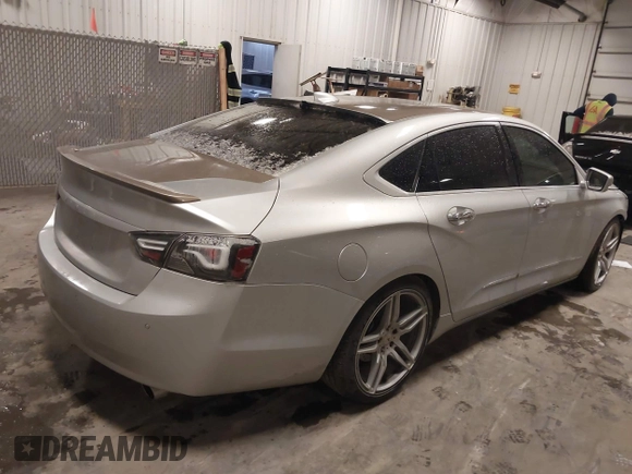 2015 Chevrolet Impala LT with VIN 2G1125S34F9277731, listed as a IAAI auction lot 41835811 with 102,628 mi miles and . Bid and sale history available at DreamBid. Image 4.