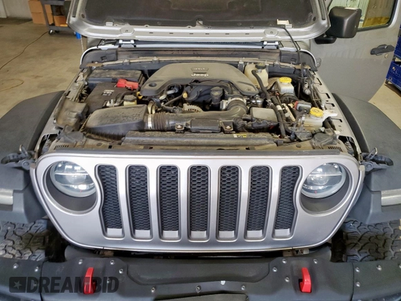 2018 Jeep Wrangler Unlimited Rubicon z VIN 1C4HJXFG5JW111896, wystawiony jako Copart lot #65800475 z przebiegiem Nie podano mil oraz Szkoda całkowita • Salvage title. Historia ofert i sprzedaży dostępna na DreamBid. Obrazek 12.