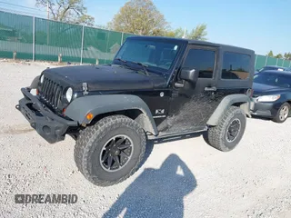 2008 Jeep Wrangler X with VIN 1J4FA24118L646979, listed as a IAAI auction lot 41981709 with 142,081 mi miles and . Bid and sale history available at DreamBid. Image 17.