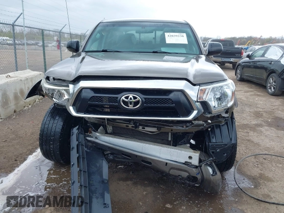 2015 Toyota Tacoma with VIN 3TMLU4EN8FM198605, listed as a IAAI auction lot 42039238 with 132,109 mi miles and . Bid and sale history available at DreamBid. Image 6.