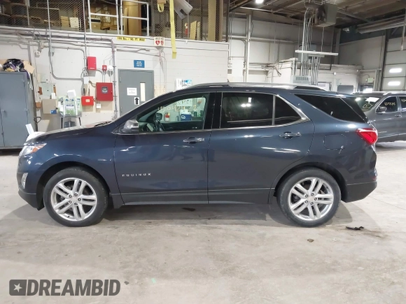 2019 Chevrolet Equinox Premier z VIN 3GNAXNEVXKS500672, wystawiony jako IAAI lot #42042922 z przebiegiem 77 440 mil mil oraz . Historia ofert i sprzedaży dostępna na DreamBid. Obrazek 15.