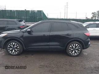 2020 Ford Escape SE Sport Hybrid with VIN 1FMCU9BZ9LUC24975, listed as a IAAI auction lot 41445033 with 93,262 mi miles and . Bid and sale history available at DreamBid. Image 14.