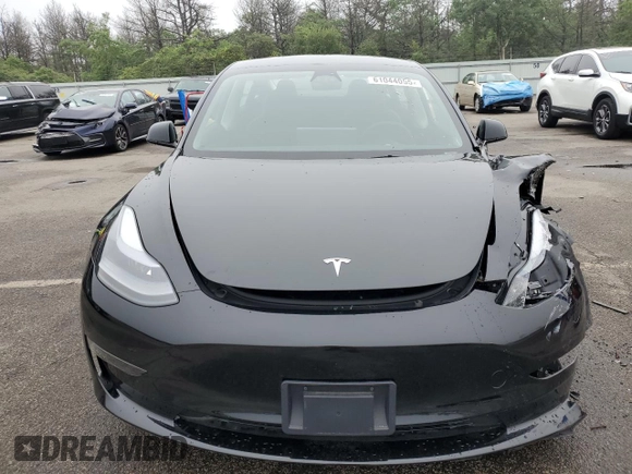 2023 Tesla Model 3 with VIN 5YJ3E1EA9PF687187, listed as a Copart auction lot 61044055 with 7,007 mi miles and Salvage title. Bid and sale history available at DreamBid. Image 5.
