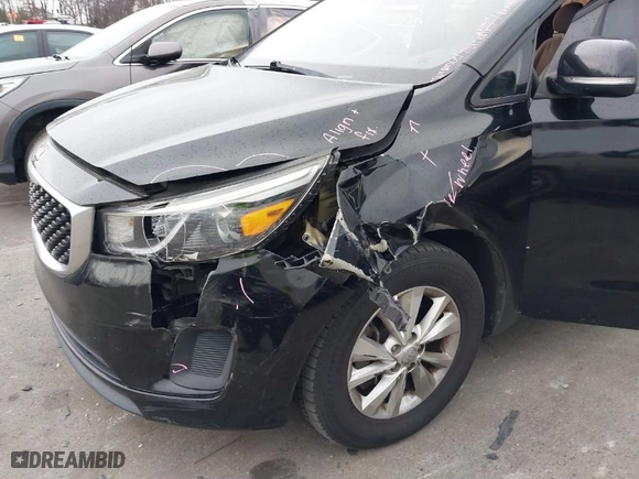 2016 Kia Sedona L with VIN KNDMA5C15G6168708, listed as a IAAI auction lot 41695088 with 105,364 mi miles. Bid and sale history available at carsss.com. Image 12.