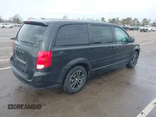 2015 Dodge Grand Caravan SE with VIN 2C4RDGBG8FR669355, listed as a IAAI auction lot 41486867 with 189,650 mi miles and . Bid and sale history available at DreamBid. Image 4.