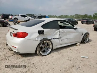 2015 BMW M4 with VIN WBS3R9C5XFK332533, listed as a Copart auction lot 57030615 with 97,739 mi miles and Salvage title. Bid and sale history available at DreamBid. Image 3.