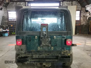 1994 Jeep Wrangler z VIN 1J4FY29S2RP471794, wystawiony jako Copart lot #47488005 z przebiegiem 165 900 mil mil oraz Nie do naprawy • Non repairable. Historia ofert i sprzedaży dostępna na DreamBid. Obrazek 6.
