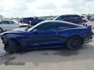 2018 Ford Mustang EcoBoost z VIN 1FA6P8TH0J5104312, wystawiony jako IAAI lot #42532806 z przebiegiem 87 564 mil mil oraz . Historia ofert i sprzedaży dostępna na DreamBid. Obrazek 15.