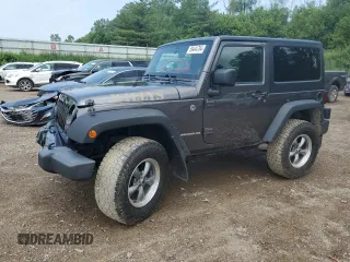 2014 Jeep Wrangler Sport with VIN 1C4AJWAG9EL223644, listed as a Copart auction lot 59444784 with 106,947 mi miles and Non Repairable. Bid and sale history available at carsss.com. Image 1.